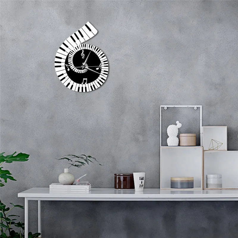 Black and white irregular-shaped wall clock with treble clef and piano keyboard notes design.