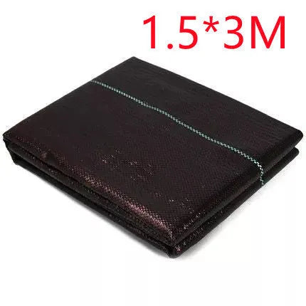 Black composite woven PE weed-proof cloth roll for farmland and greenhouse use.