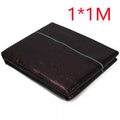 Black polyethylene weed control fabric roll for garden ground cover and greenhouse use.