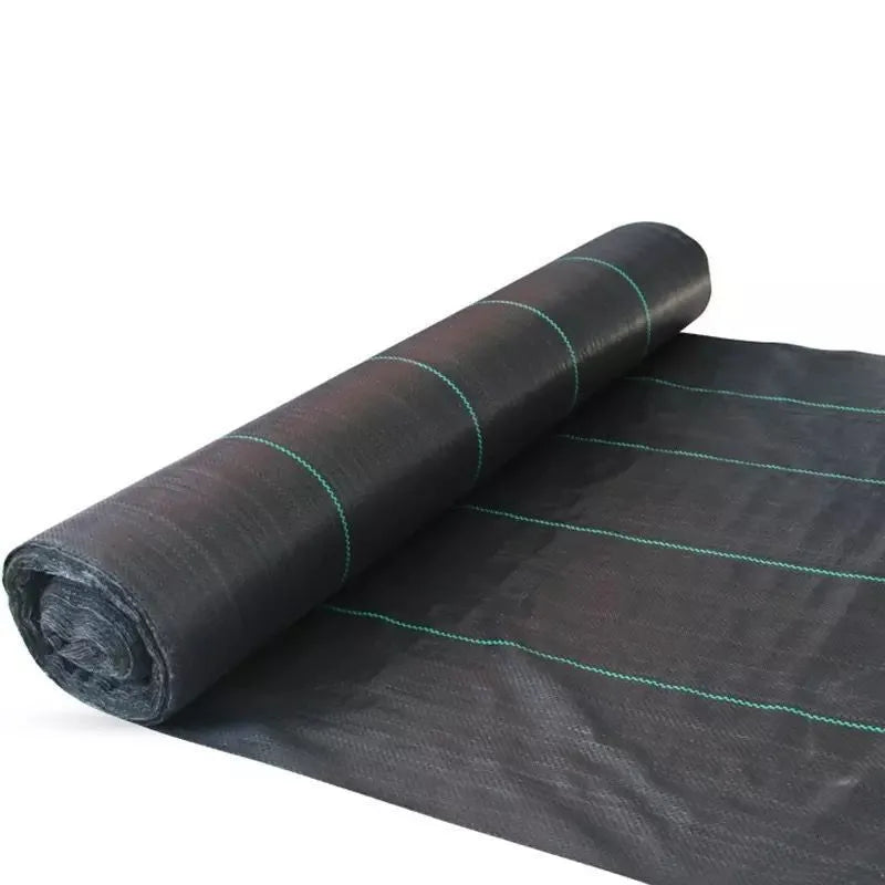 Black polyethylene weed control fabric roll for garden ground cover and greenhouse use.