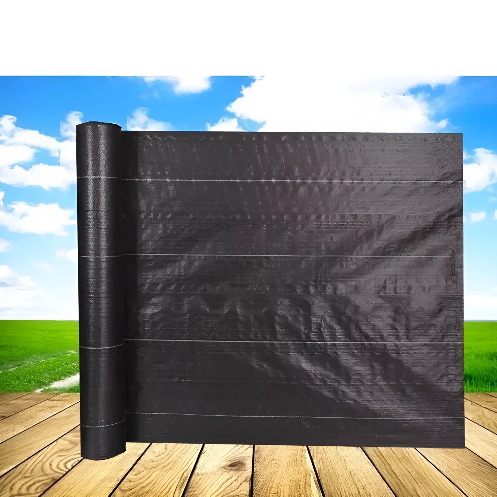 Black polyethylene weed control fabric roll for garden ground cover and greenhouse use.
