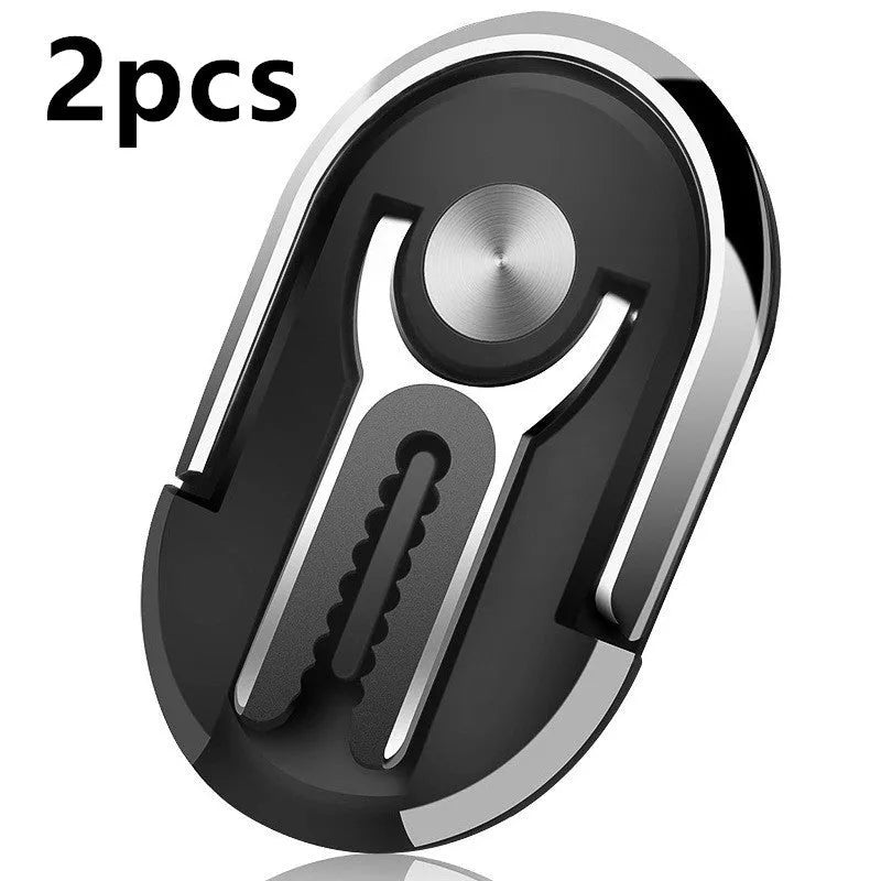 Universal car mobile phone mount bracket attached to car air vent showing adjustable clamp and 360-degree rotation ball joint