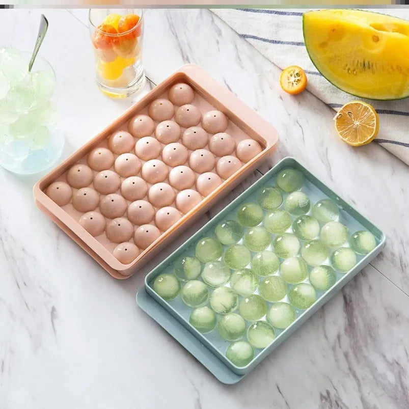 Sky blue 3D round ice mould tray with easy-release design showing spherical ice ball compartments