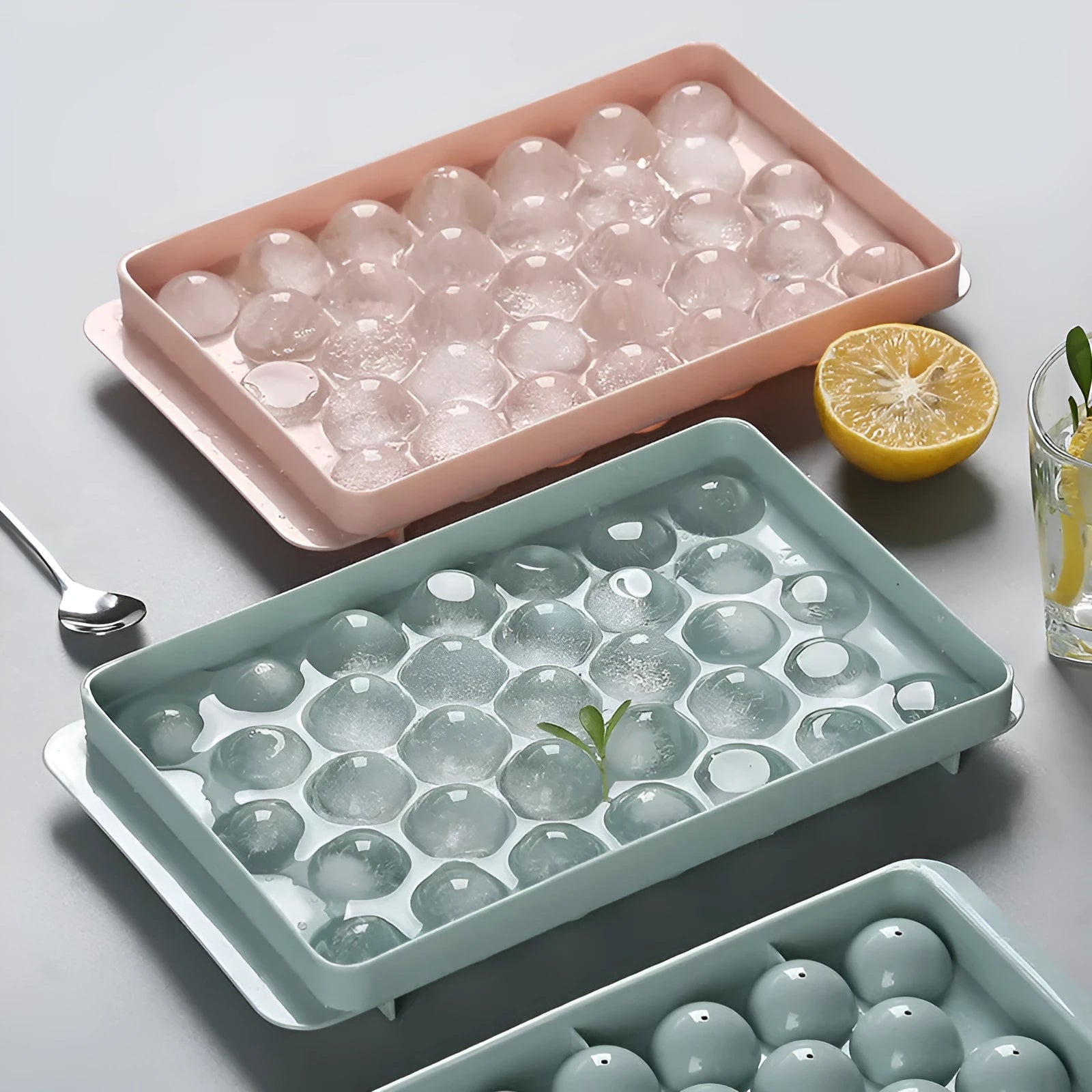 Sky blue 3D round ice mould tray with easy-release design showing spherical ice ball compartments