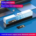 Mirror Sound Blaster Bluetooth clock speaker with LED mirror screen showing time and temperature, black unit on desk