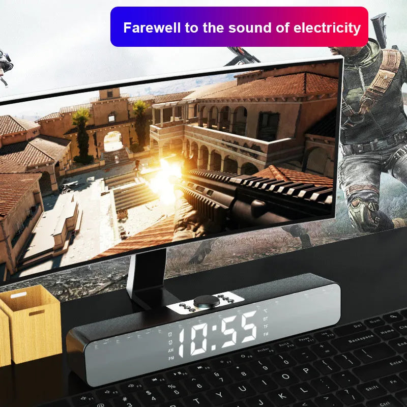 Mirror Sound Blaster Bluetooth clock speaker with LED mirror screen showing time and temperature, black unit on desk