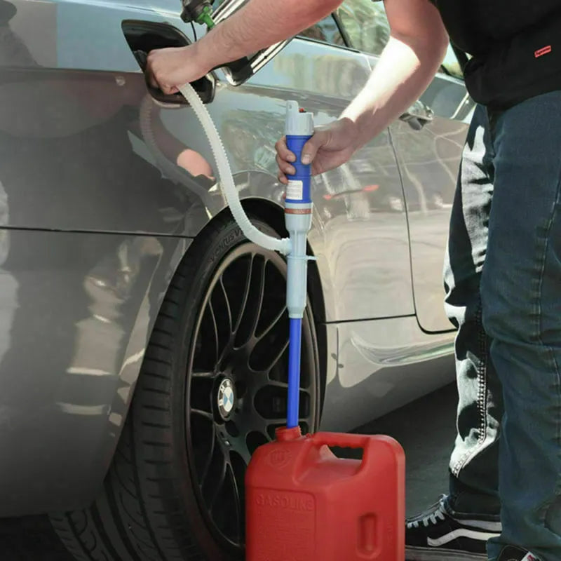 Blue and red manual hand siphon pump for fuel and liquid transfer