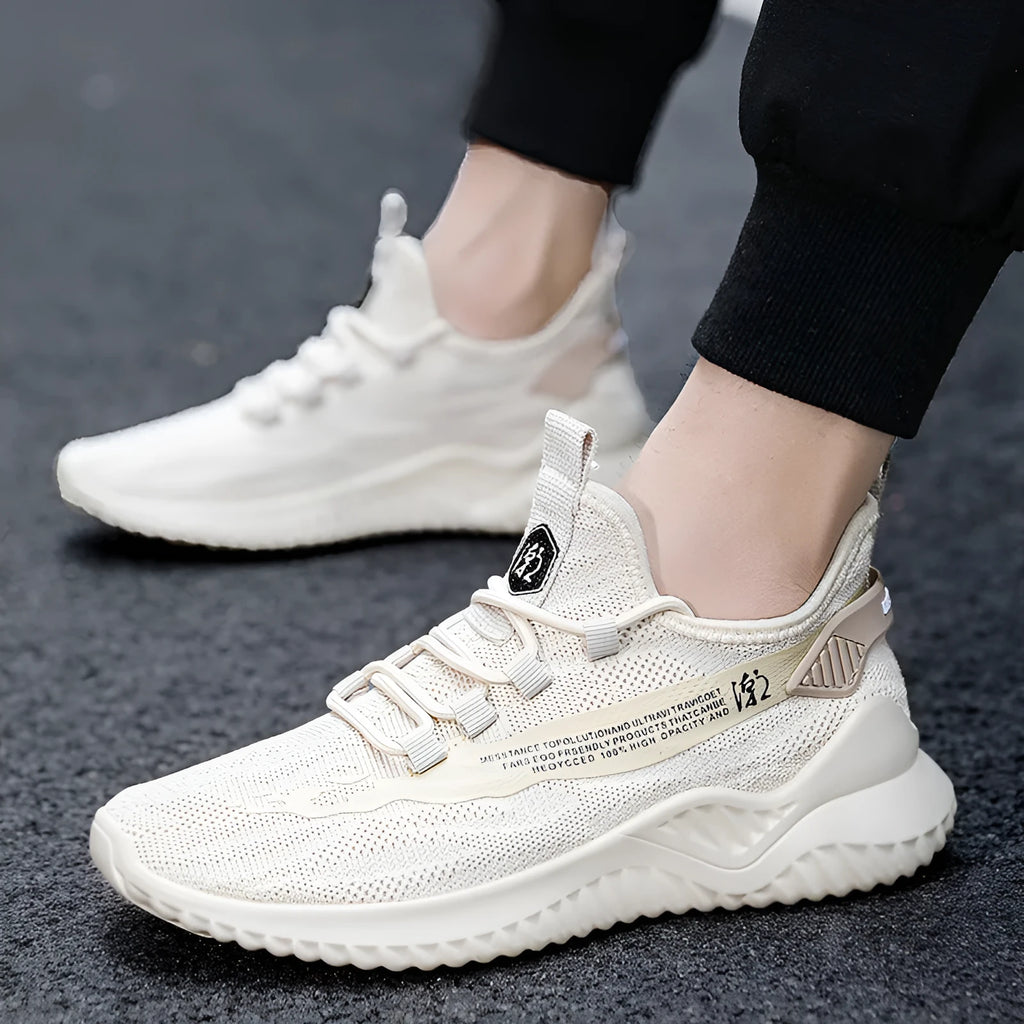 Men's white mesh low-top sports shoes with rubber sole and lace-up front.