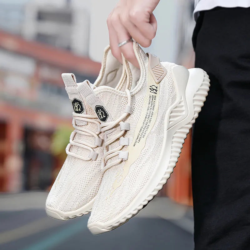Men's white mesh low-top sports shoes with rubber sole and lace-up front.