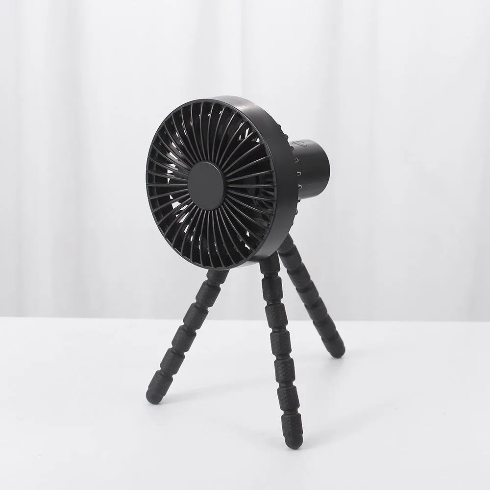 Compact USB desktop fan with a bending head on a flexible octopus tripod, in white colour.