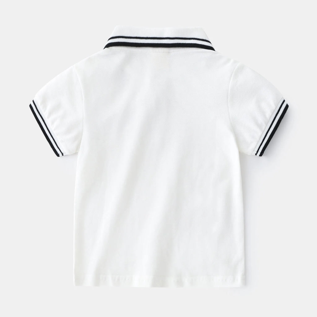 Boys' white and black short sleeve cotton polo t-shirt shown flat, suitable for summer.