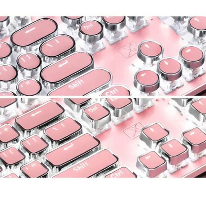Queen Lipstick mechanical keyboard with silver base, pink keycaps, and green mechanical switches on a desk.