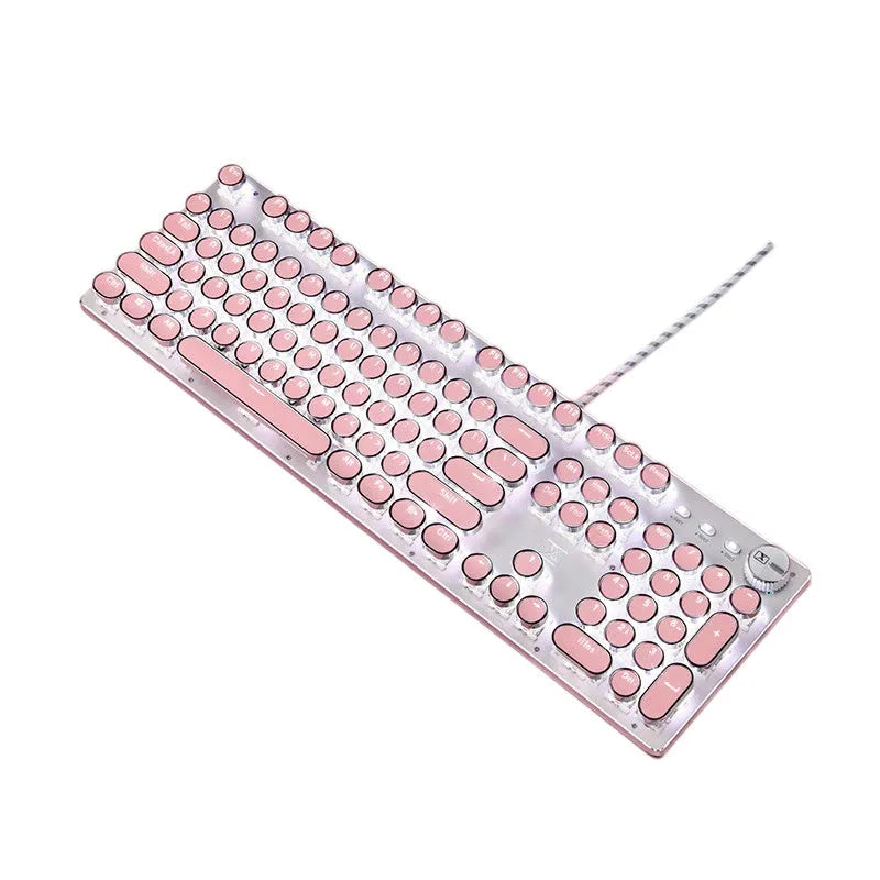 Queen Lipstick mechanical keyboard with silver base, pink keycaps, and green mechanical switches on a desk.