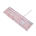 Queen Lipstick mechanical keyboard with silver base, pink keycaps, and green mechanical switches on a desk.