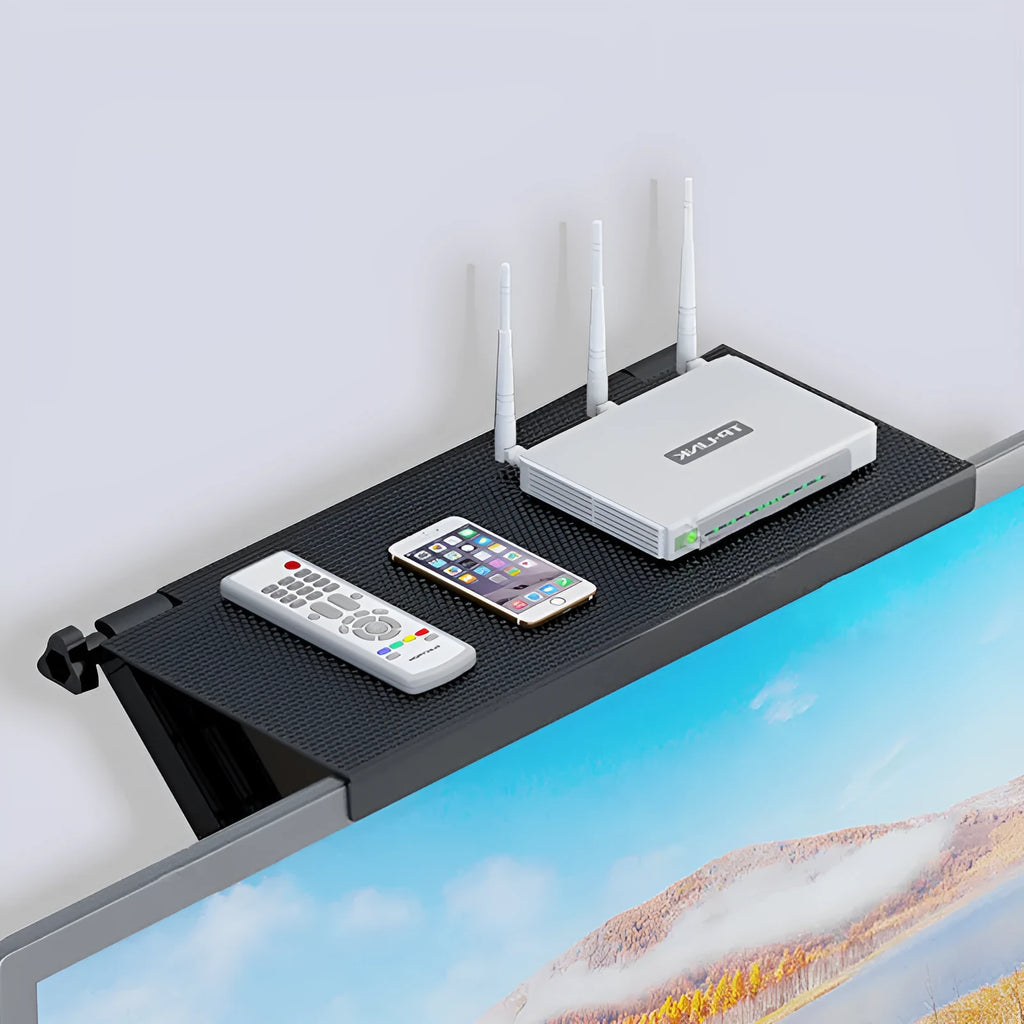 Plastic desktop storage rack for TV set-top box and router organisation with hook installation.