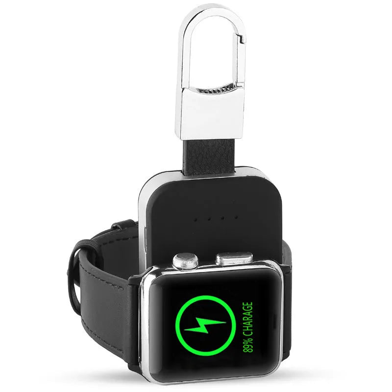 Black portable Apple Watch wireless charging power bank on a keyring.
