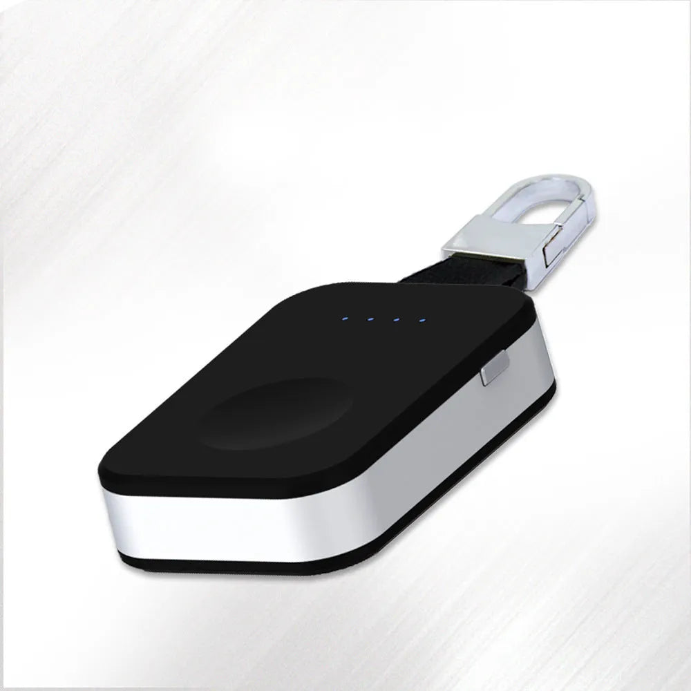 Black portable Apple Watch wireless charging power bank on a keyring.