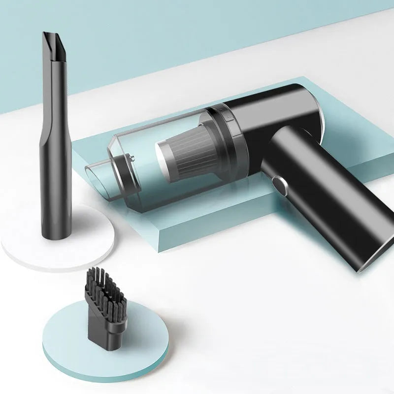 Wireless handheld car vacuum cleaner in black or white on a car seat.