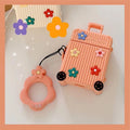 Silicone flip cover for Apple AirPods in pink purple white green orange yellow colours