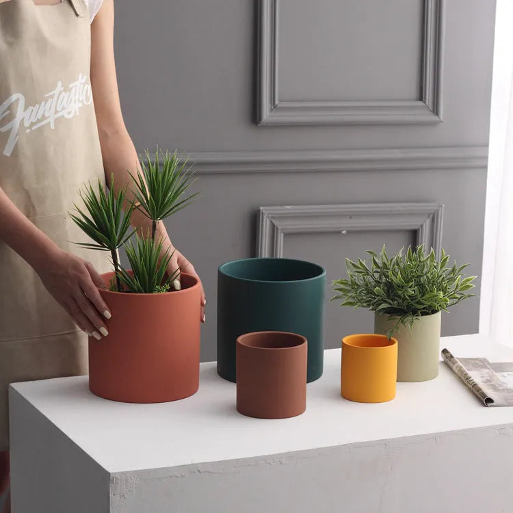 Cylindrical ceramic flowerpot with drainage hole in Nordic industrial style, suitable for succulents and green plants