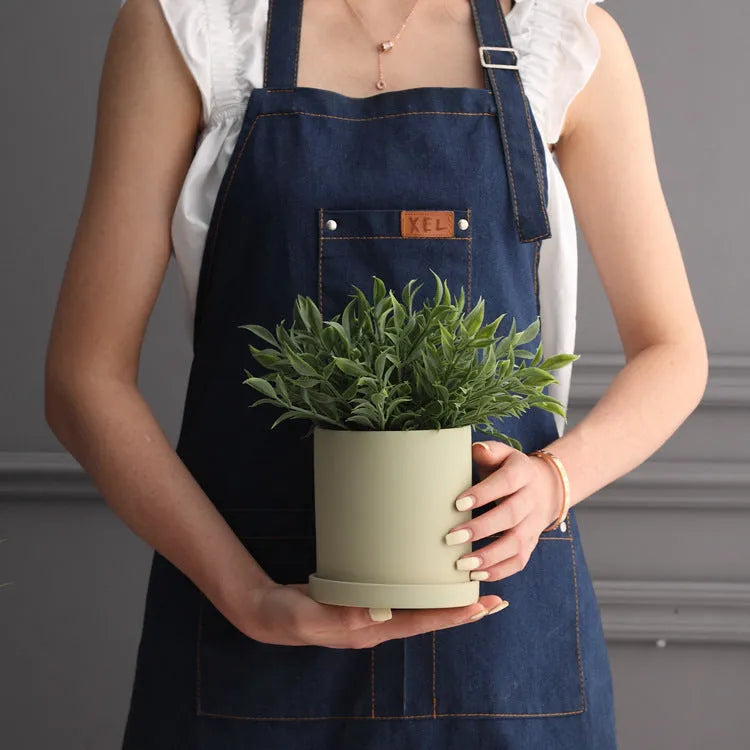 Cylindrical ceramic flowerpot with drainage hole in Nordic industrial style, suitable for succulents and green plants