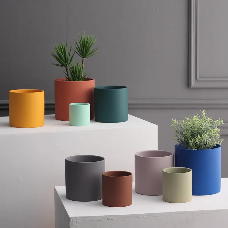 Cylindrical ceramic flowerpot with drainage hole in Nordic industrial style, suitable for succulents and green plants