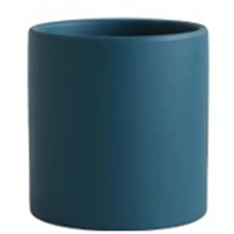 Cylindrical ceramic succulent planter with drainage hole in Nordic style, shown in a selected colour.