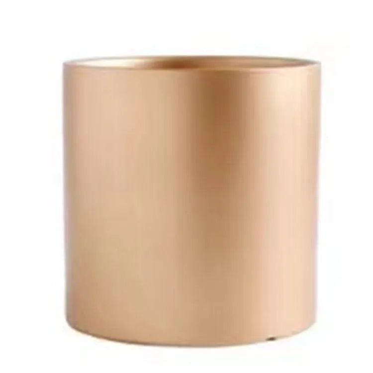 Cylindrical ceramic succulent planter with drainage hole in Nordic style, shown in a selected colour.