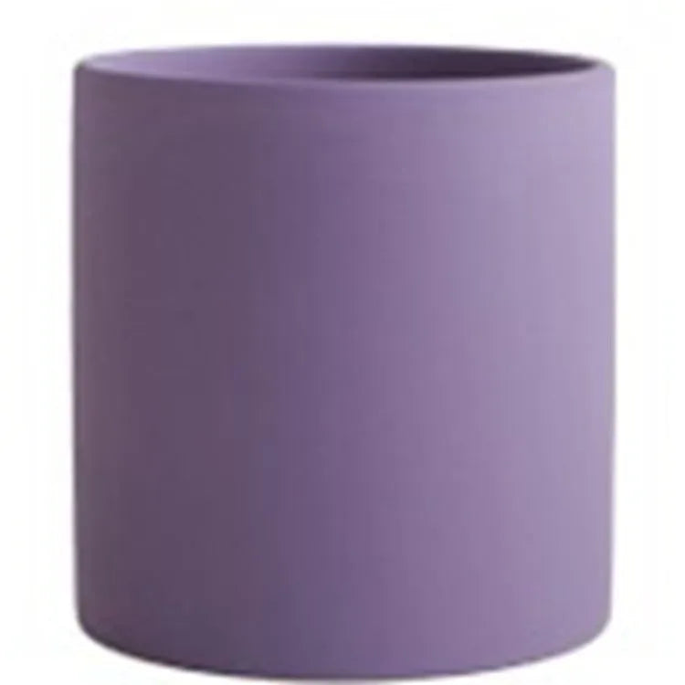 Cylindrical ceramic succulent planter with drainage hole in Nordic style, shown in a selected colour.