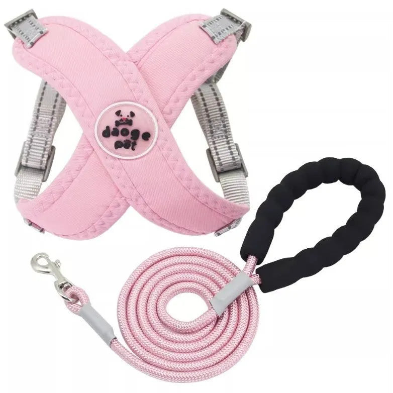 Blue dog vest with an integrated hand-holding rope leash, shown on a medium-sized dog.