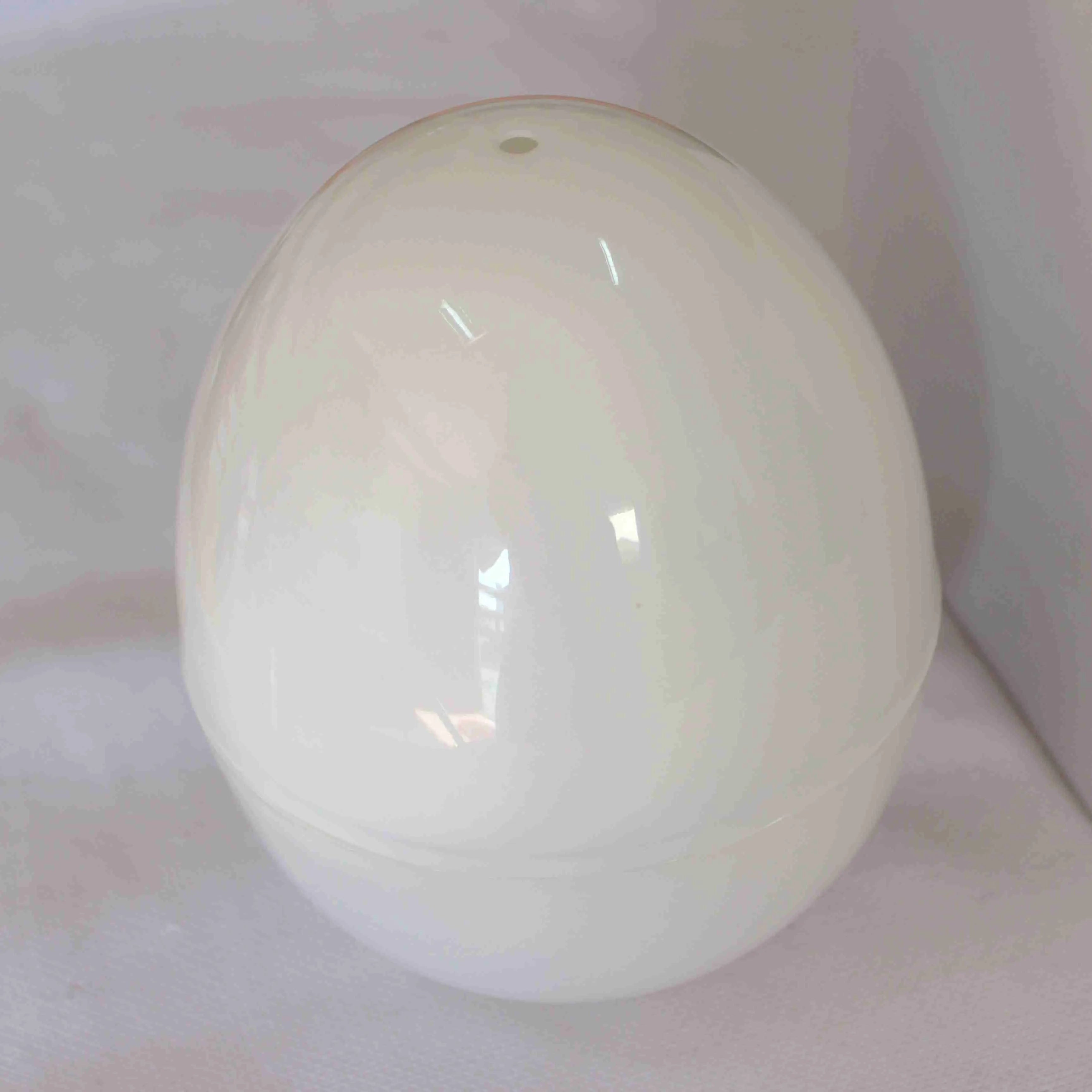 White microwave egg steamer cooker with capacity for 1-4 eggs and adjustable cooking times