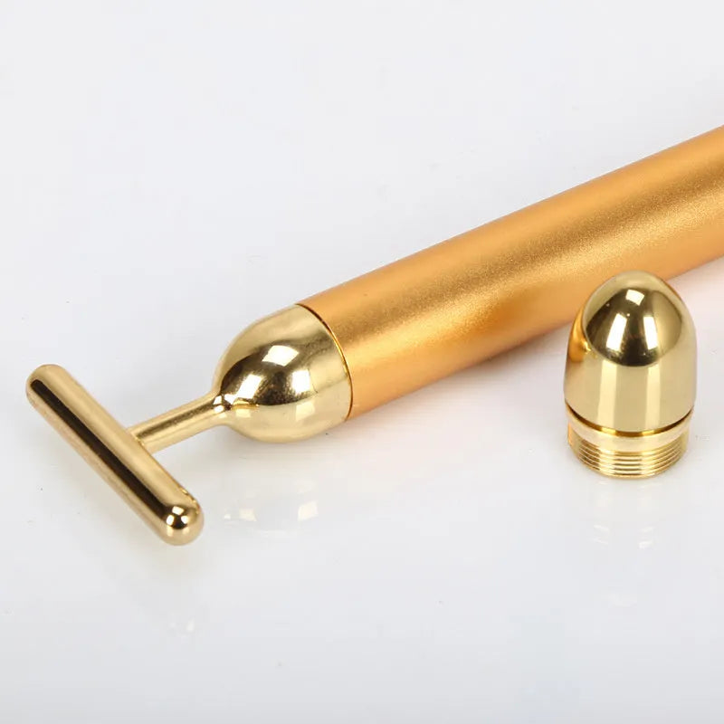 24K gold vibration pulse facial beauty bar for skin firming and wrinkle reduction, showing a stick massager with gold head