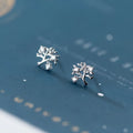 White gold coloured copper stud earrings with cute little tree design electroplated finish for women