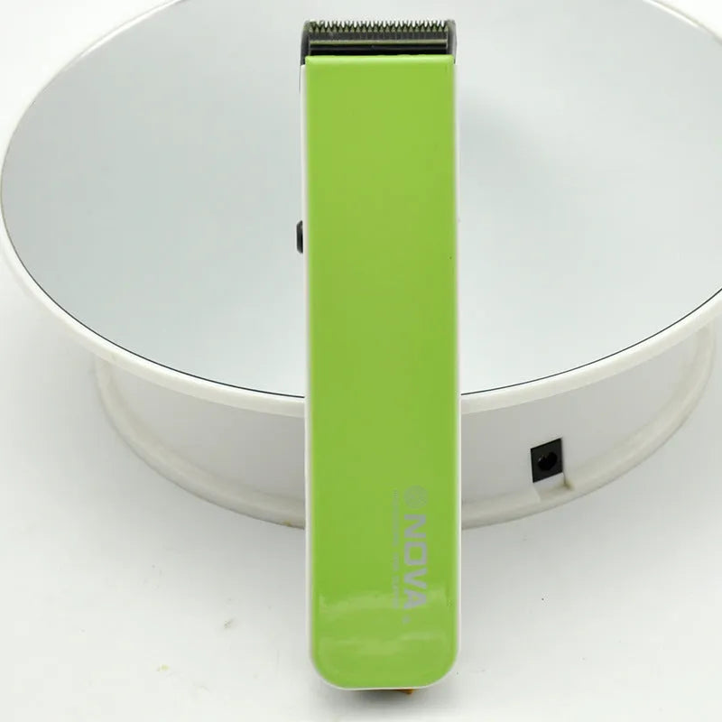 Electric hair clipper with removable blade head, shown in blue colour option.