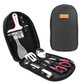8-piece stainless steel camp kitchen utensil set in black storage bag on outdoor table