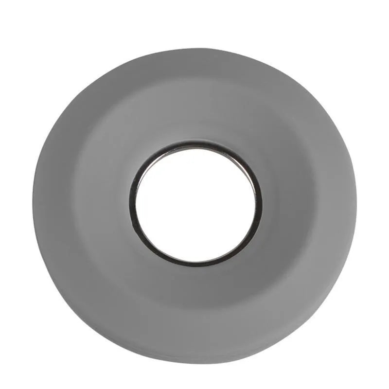 Donut-shaped silicone cord reel in three colours for organising headphones and phone cables