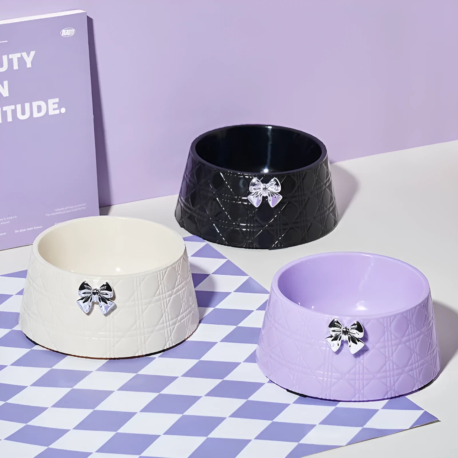 Diamond pattern pet feeding bowl with bowknot decoration in multiple colour options for dogs and cats