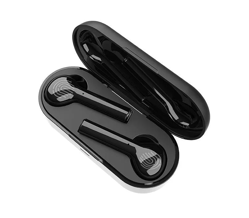 Black and white wireless touch control earbuds with a charging case on a table.