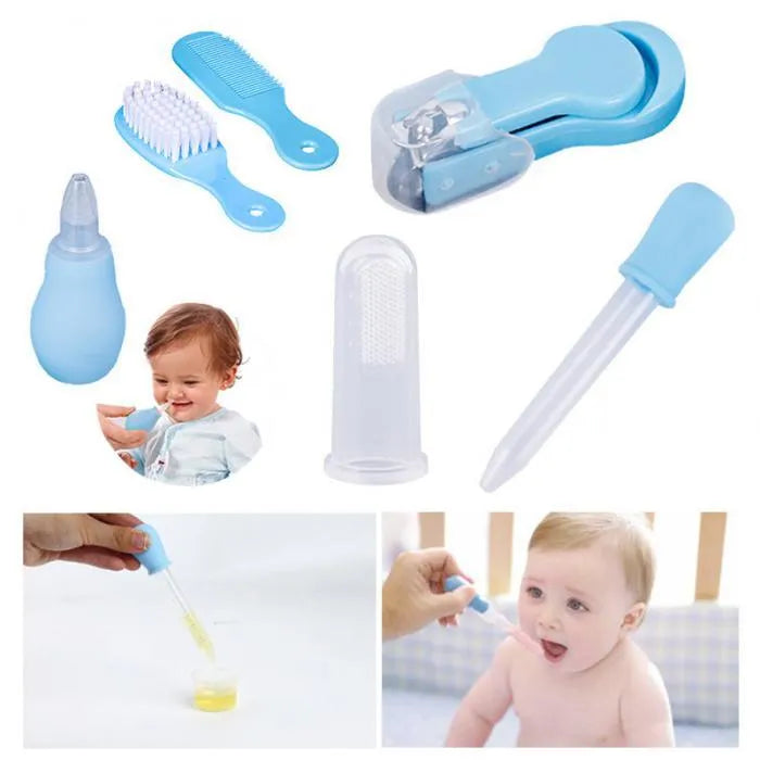 Portable baby health suit 9-piece grooming set in pink with scissors, clippers, comb and thermometer on white background