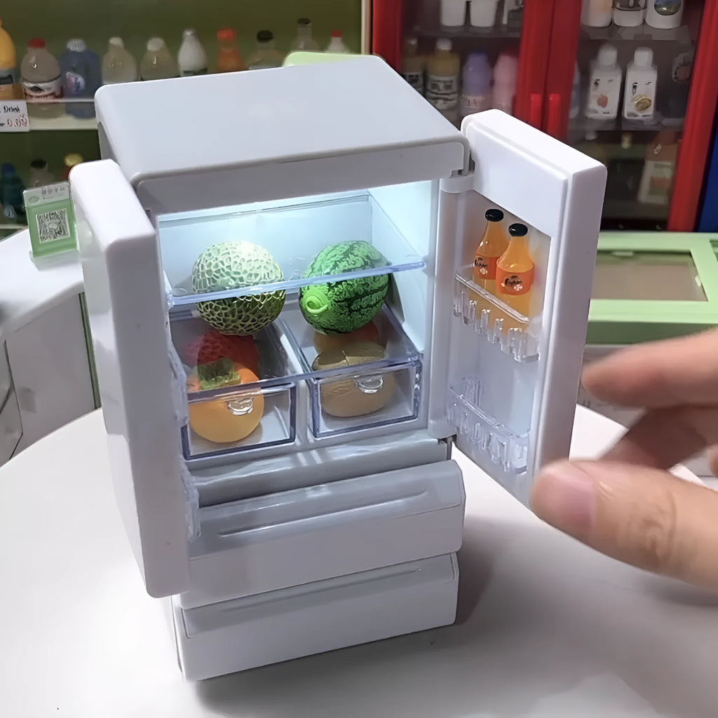 White miniature candy shop model with LED light on, showing detailed plastic windows and door.