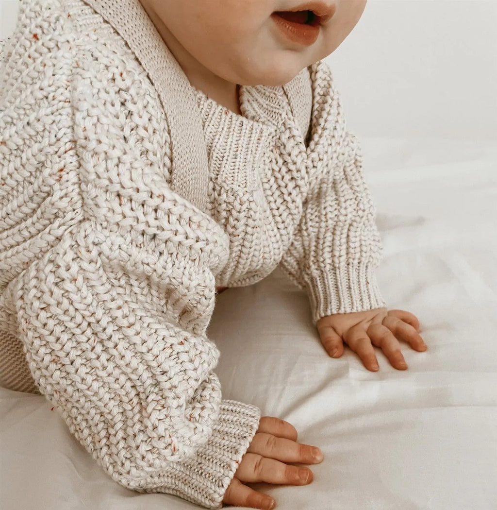 Children winter cotton oversized sweatersuit top in vanilla colour, laid flat showing front design for babies and toddlers