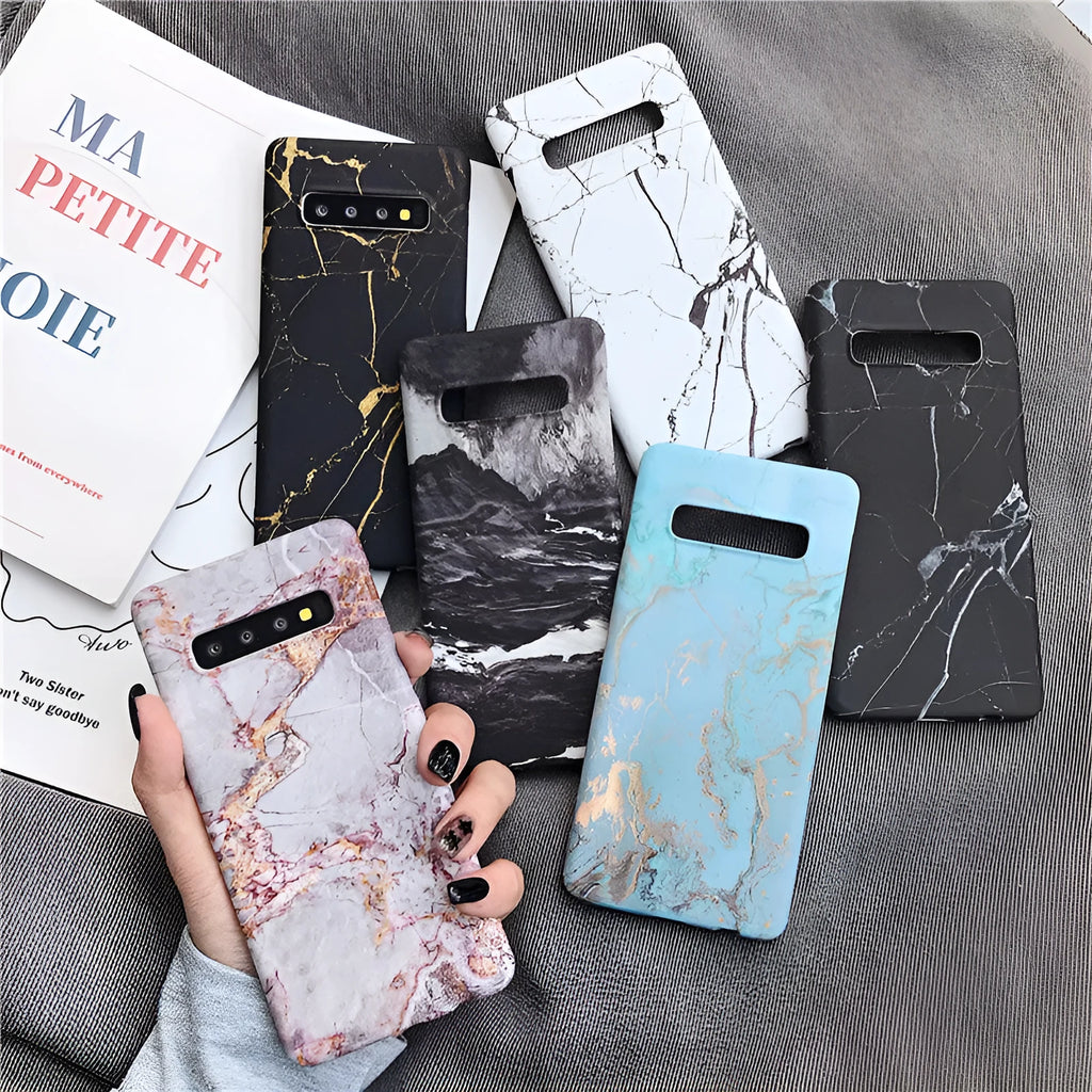 Samsung Galaxy phone back cover case with a white and grey marble pattern design