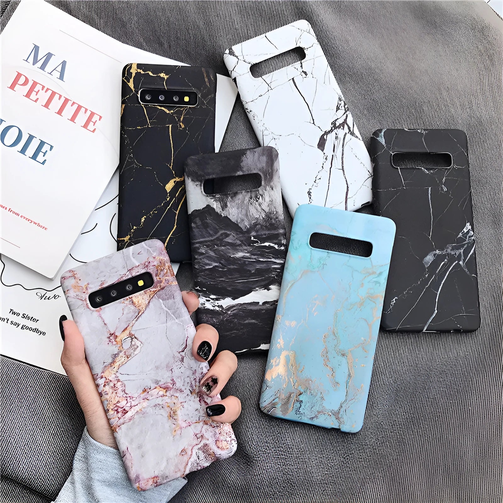 Samsung Galaxy phone back cover case with a white and grey marble pattern design
