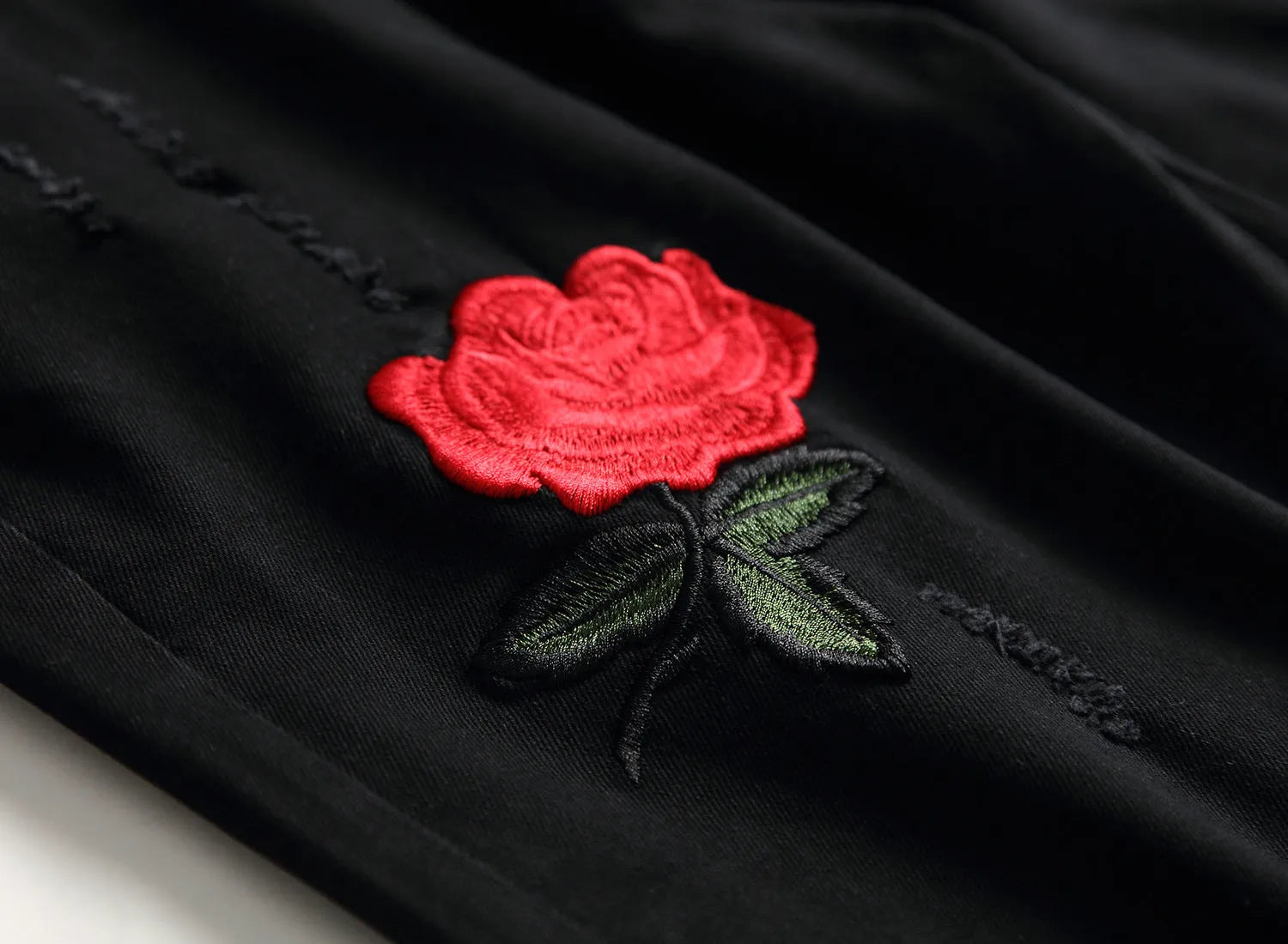 Black high-waist rose-embroidered shredded stretch denim jeans for women
