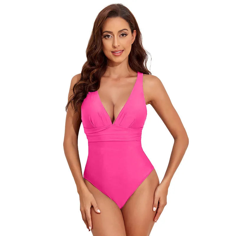 Women's solid colour cross-shoulder one-piece swimsuit in minimalist design