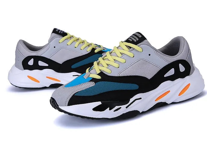 Peliam sneakers in black and grey, lace-up style, available in sizes 39-44