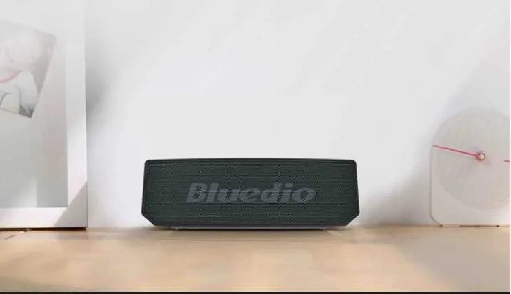 Black BS-6 Bluetooth cloud smart speaker showing front grille and compact rectangular design.
