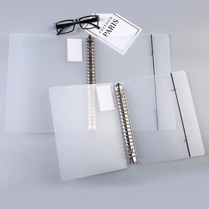 Class Notepad 26-hole A5 looped binder with PP matte cover on a desk.