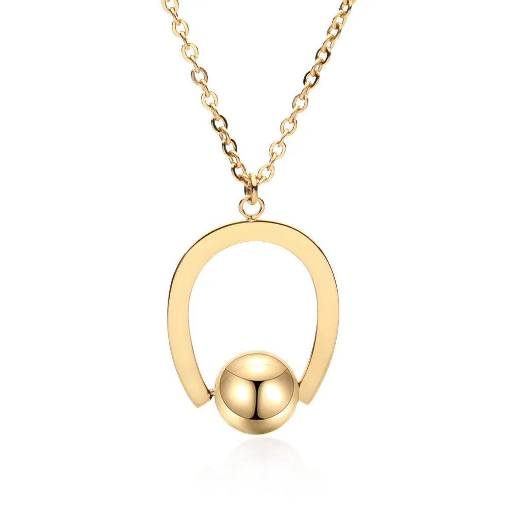 Gold or silver adjustable stainless steel necklace with a geometric pendant on a cross chain.