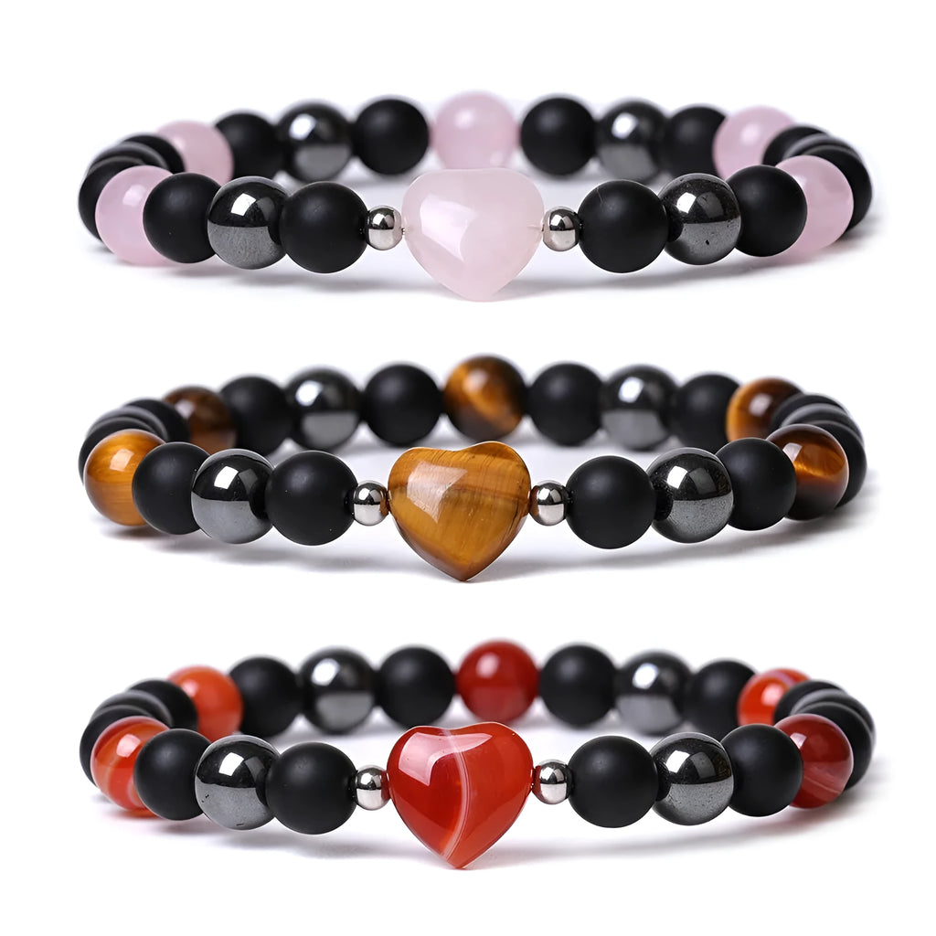 Hand-cut geometric peach heart stone bracelet with moon symbols in tigereye colour